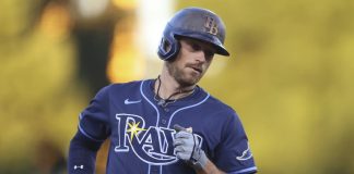 Tampa Bay Rays' Brandon Lowe jogs around the bases after hitting a two-run home run during the second inning of a baseball game against the Athletics, Wednesday, Aug. 13, 2025, in West Sacramento, Calif. (AP Photo/Scott Marshall)