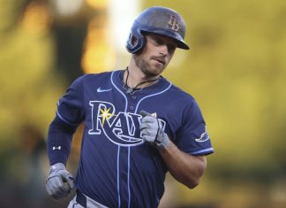 Tampa Bay Rays' Brandon Lowe jogs around the bases after hitting a two-run home run during the second inning of a baseball game against the Athletics, Wednesday, Aug. 13, 2025, in West Sacramento, Calif. (AP Photo/Scott Marshall)