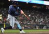 Tampa Bay Rays’ Yandy Díaz hits an RBI single during the ninth inning of a baseball game against the San Francisco Giants, Friday, Aug. 15, 2025, in San Francisco. (AP Photo/Godofredo A. Vásquez)