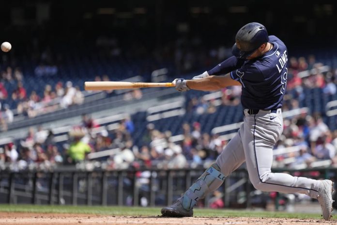 Rays Defeat Nationals 7-4 Tampa Bay Rays designated hitter Brandon Lowe hits a grand slam against the Washington Nationals during the second inning of a baseball game at Nationals Park, Sunday, Aug. 31, 2025, in Washington. (AP Photo/Jess Rapfogel)