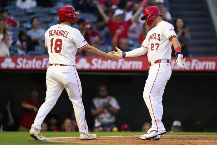 Rays Fall To Angels 5-1 Los Angeles Angels' Mike Trout, right, and Nolan Schanuel, left, greet each other after scoring during the third inning of a baseball game against the Tampa Bay Rays, Monday, Aug. 4, 2025, in Anaheim, Calif. (AP Photo/William Liang)