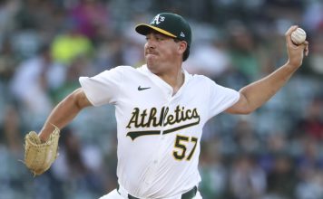 Athletics pitcher Jacob Lopez throws to an Tampa Bay Rays batter during the first inning of a baseball game, Tuesday, Aug. 12, 2025, in West Sacramento, Calif. (AP Photo/Scott Marshall)