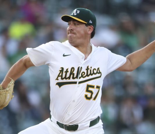 Athletics pitcher Jacob Lopez throws to an Tampa Bay Rays batter during the first inning of a baseball game, Tuesday, Aug. 12, 2025, in West Sacramento, Calif. (AP Photo/Scott Marshall)