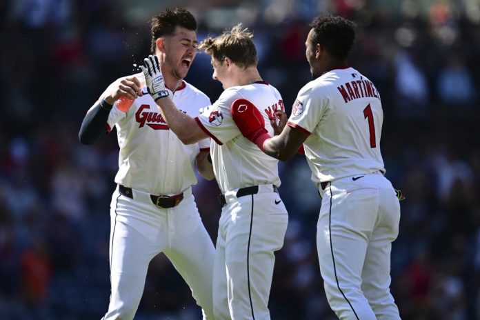 Rays Fall To Guardians 4-3 Cleveland Guardians' Kyle Manzardo, center, is congratulated by Angel Martinez, right, and Nolan Jones, left, after driving in the game winning run in the 10th inning of a baseball game against the Tampa Bay Rays, Wednesday, Aug. 27, 2025, in Cleveland. (AP Photo/David Dermer)