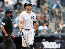 New York Yankees' Giancarlo Stanton reacts after hitting a home run in the first inning of a baseball game against the Tampa Bay Rays, Thursday, July 31, 2025, in New York. (AP Photo/Heather Khalifa)