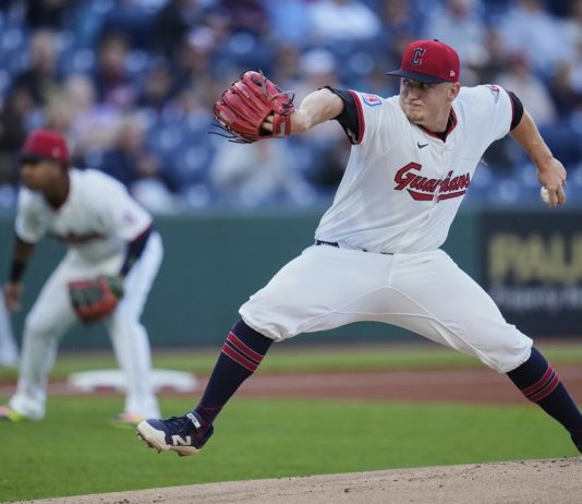 Cleveland Guardians' Parker Messick pitches in the first inning of a baseball game against the Tampa Bay Rays in Cleveland, Tuesday, Aug. 26, 2025. (AP Photo/Sue Ogrocki)