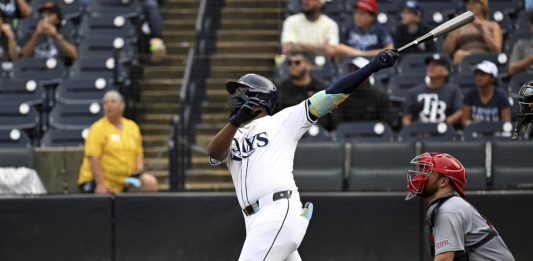 Tampa Bay Rays' Junior Caminero hits a grand slam during the fifth inning of a baseball game against the St. Louis Cardinals, Sunday, Aug. 24, 2025, in Tampa, Fla. (AP Photo/Jason Behnken)