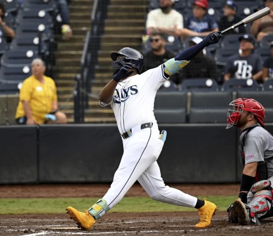 Tampa Bay Rays' Junior Caminero hits a grand slam during the fifth inning of a baseball game against the St. Louis Cardinals, Sunday, Aug. 24, 2025, in Tampa, Fla. (AP Photo/Jason Behnken)