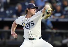 Tampa Bay Rays pitcher Ryan Pepiot delivers to the Cleveland Guardians during the first inning of a baseball game Thursday, Sept. 4, 2025, in Tampa, Fla. (AP Photo/Chris O'Meara)