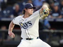 Tampa Bay Rays pitcher Ryan Pepiot delivers to the Cleveland Guardians during the first inning of a baseball game Thursday, Sept. 4, 2025, in Tampa, Fla. (AP Photo/Chris O'Meara)