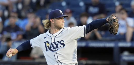 Tampa Bay Rays pitcher Shane Baz delivers to the Seattle Mariners during the first inning of a baseball game Monday, Sept. 1, 2025, in Tampa, Fla. (AP Photo/Chris O'Meara)