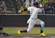 Tampa Bay Rays' Yandy Díaz (2) singles off Seattle Mariners pitcher George Kirby during the second inning of a baseball game Wednesday, Sept. 3, 2025, in Tampa, Fla. (AP Photo/Chris O'Meara)