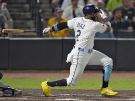 Tampa Bay Rays' Yandy Díaz (2) singles off Seattle Mariners pitcher George Kirby during the second inning of a baseball game Wednesday, Sept. 3, 2025, in Tampa, Fla. (AP Photo/Chris O'Meara)