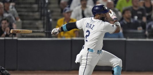 Tampa Bay Rays' Yandy Díaz (2) singles off Seattle Mariners pitcher George Kirby during the second inning of a baseball game Wednesday, Sept. 3, 2025, in Tampa, Fla. (AP Photo/Chris O'Meara)
