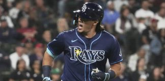 Tampa Bay Rays’ Tristan Gray reacts as he rounds the bases after hitting a solo home run during the seventh inning of a baseball game against the Chicago White Sox in Chicago, Tuesday, Sept. 9, 2025. (AP Photo/Nam Y. Huh)
