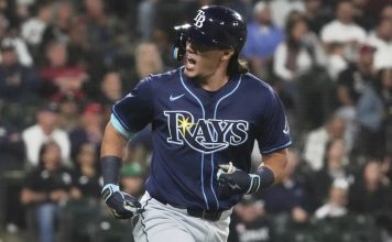 Tampa Bay Rays’ Tristan Gray reacts as he rounds the bases after hitting a solo home run during the seventh inning of a baseball game against the Chicago White Sox in Chicago, Tuesday, Sept. 9, 2025. (AP Photo/Nam Y. Huh)