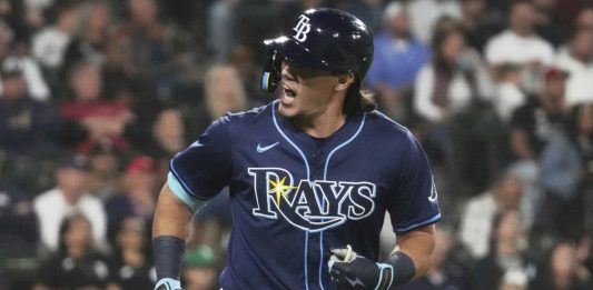 Tampa Bay Rays’ Tristan Gray reacts as he rounds the bases after hitting a solo home run during the seventh inning of a baseball game against the Chicago White Sox in Chicago, Tuesday, Sept. 9, 2025. (AP Photo/Nam Y. Huh)