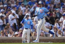 Chicago Cubs' Ian Happ (8) runs the bases after hitting a home run during the fourth inning of a baseball game against the Tampa Bay Rays, Friday, Sept. 12, 2025, in Chicago. (AP Photo/Erin Hooley)