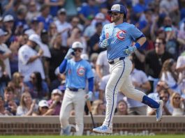 Chicago Cubs' Ian Happ (8) runs the bases after hitting a home run during the fourth inning of a baseball game against the Tampa Bay Rays, Friday, Sept. 12, 2025, in Chicago. (AP Photo/Erin Hooley)
