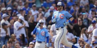 Chicago Cubs' Ian Happ (8) runs the bases after hitting a home run during the fourth inning of a baseball game against the Tampa Bay Rays, Friday, Sept. 12, 2025, in Chicago. (AP Photo/Erin Hooley)