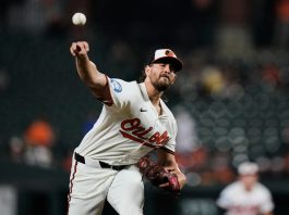 Baltimore Orioles starting pitcher Dean Kremer delivers during the first inning of a baseball game against the Tampa Bay Rays, Tuesday, Sept. 23, 2025, in Baltimore. (AP Photo/Stephanie Scarbrough)
