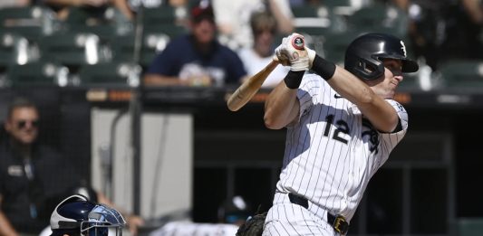 Chicago White Sox's Colson Montgomery watches his two-run single during the first inning of a baseball game against the Tampa Bay Rays, Thursday, Sept. 11, 2025, in Chicago. (AP Photo/Paul Beaty)