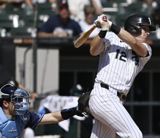 Chicago White Sox's Colson Montgomery watches his two-run single during the first inning of a baseball game against the Tampa Bay Rays, Thursday, Sept. 11, 2025, in Chicago. (AP Photo/Paul Beaty)