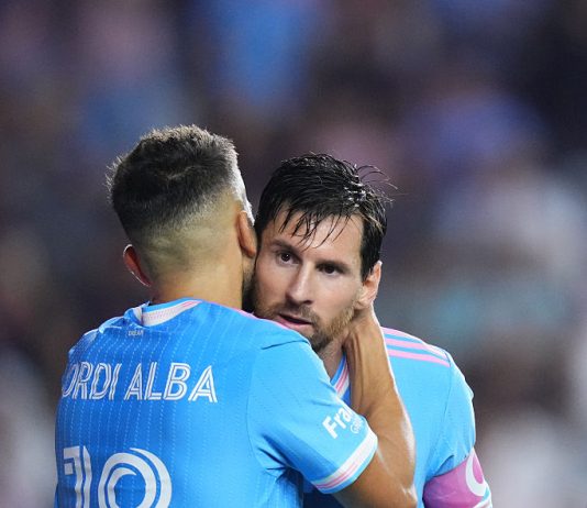 Jordi Alba of Inter Miami CF celebrates with teammate Lionel Messi #10 after scoring the team's fourth goal during the MLS match between Inter Miami CF and New England Revolution at Chase Stadium on October 04, 2025 in Fort Lauderdale, Florida.